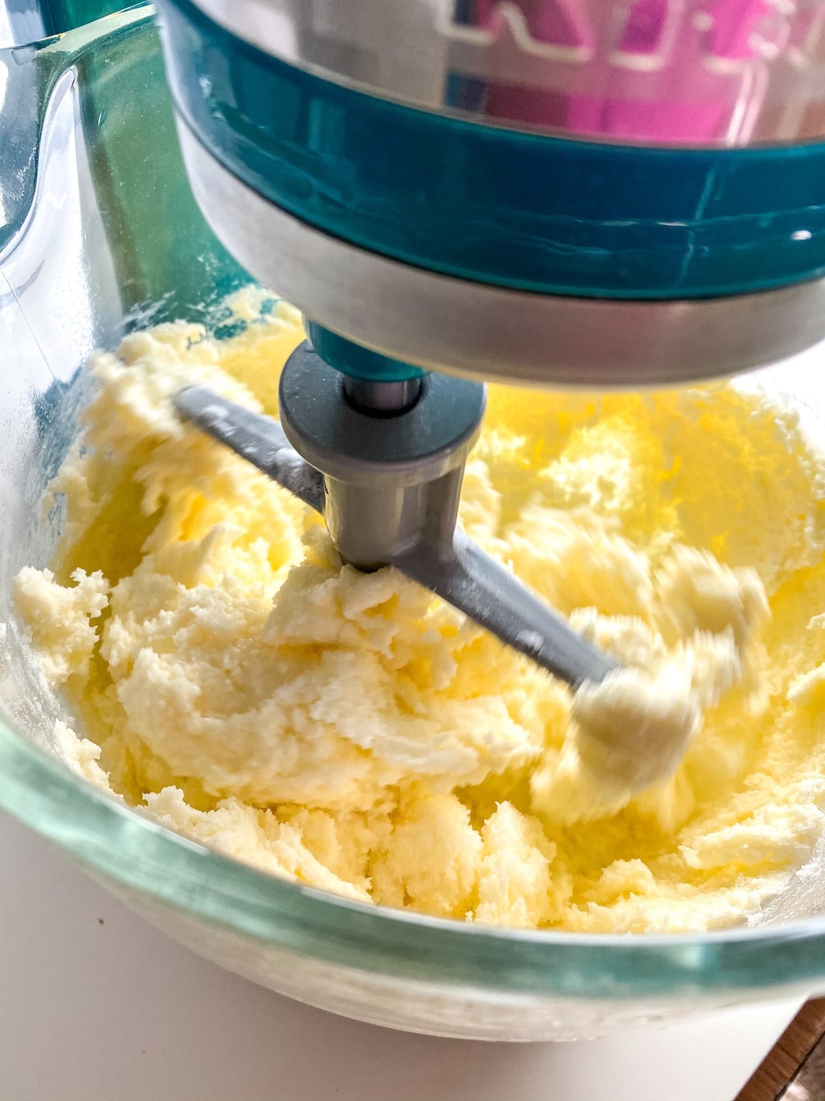 Adding eggs to batter with stand mixer