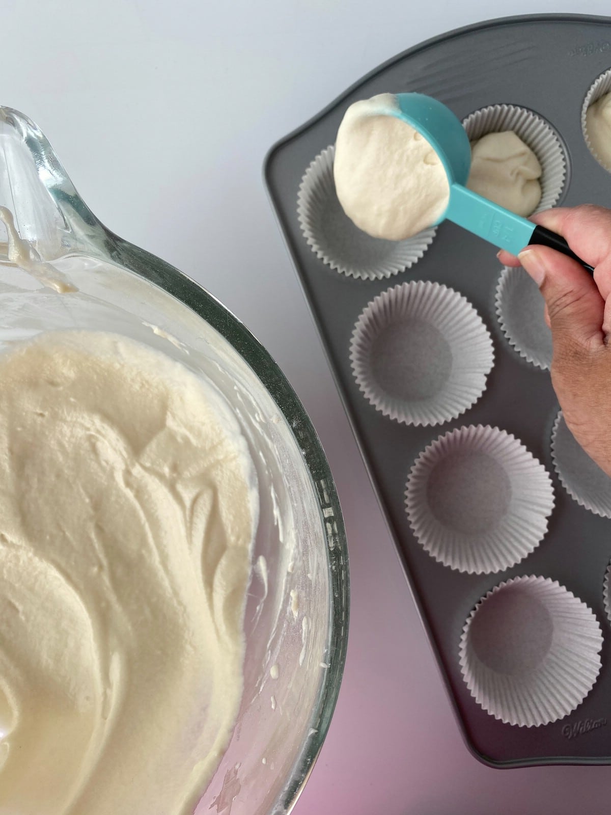 Scooping batter into cupcake liner