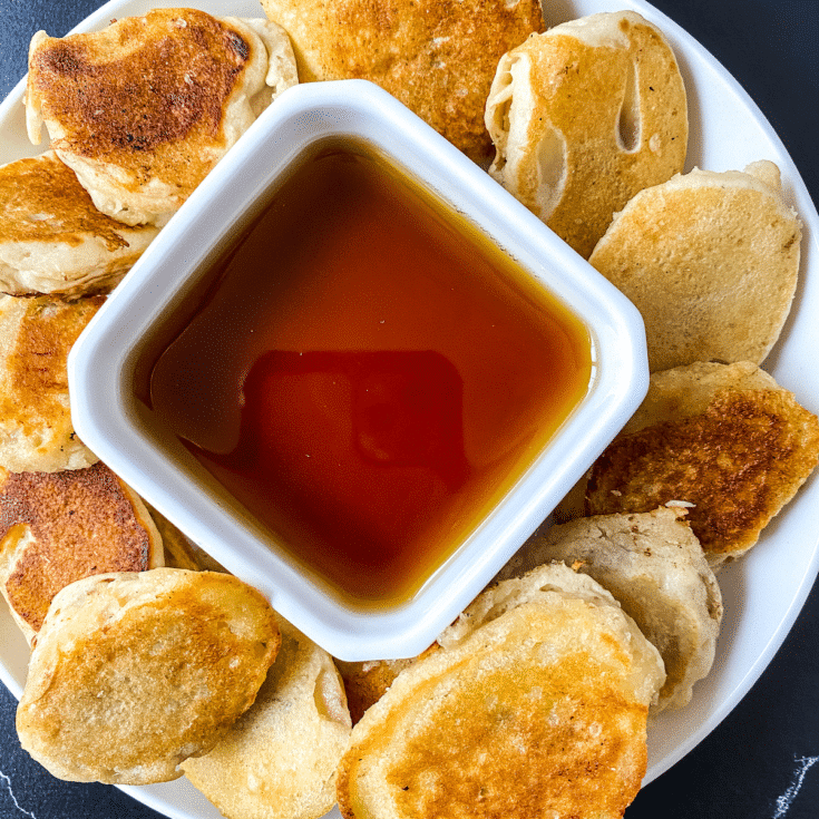 Plate of pancake dippers with syrup