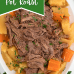 White platter with shredded beef potatoes and carrots