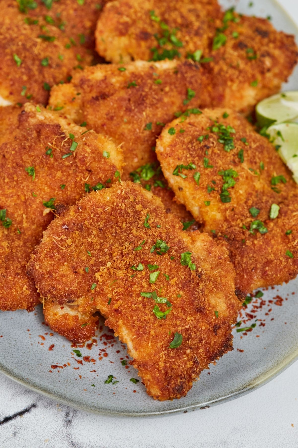 Platter of parmesan chicken thighs