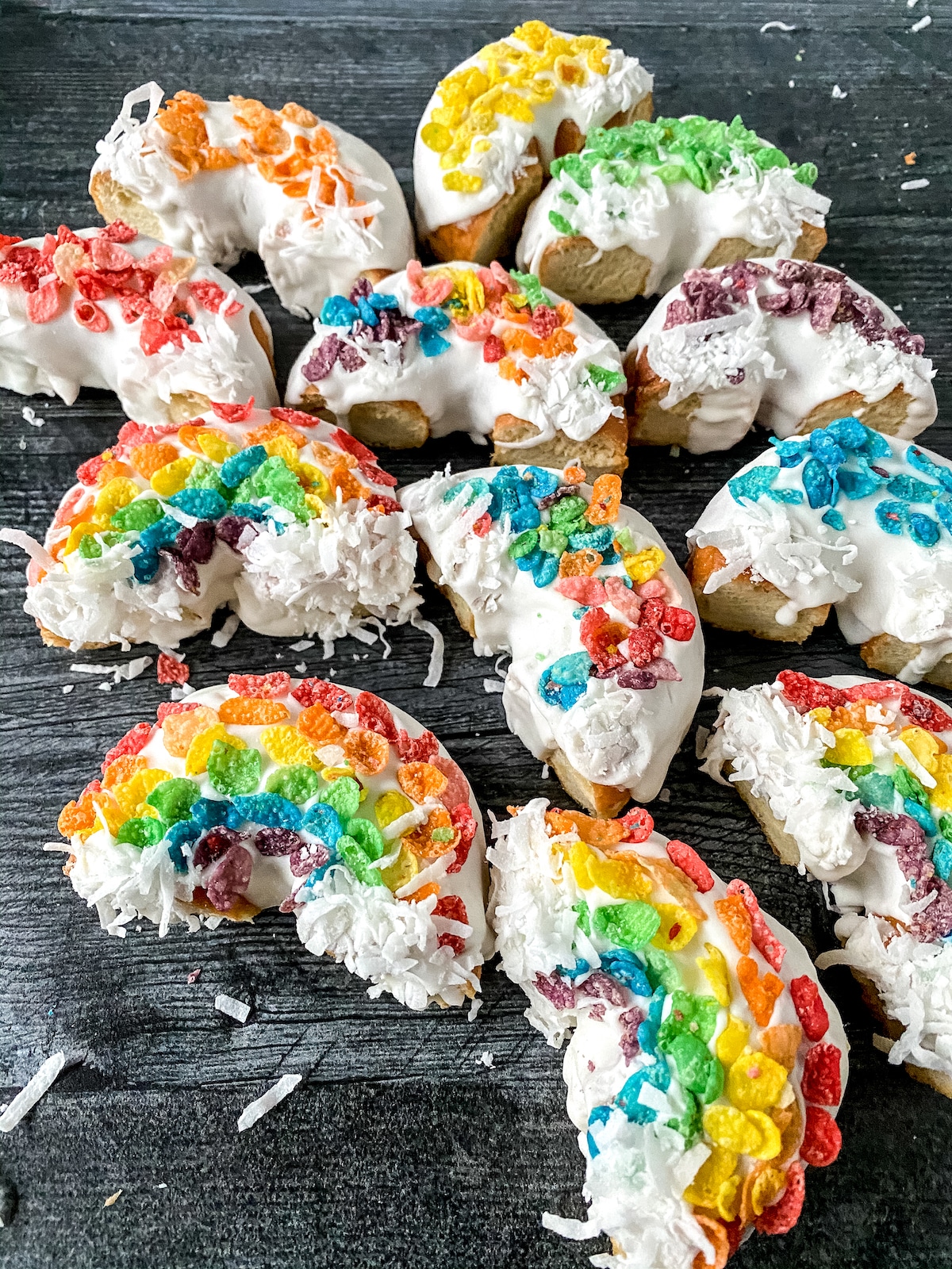 Rainbow donuts on black table