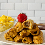Stack of stuffed french toast rolls