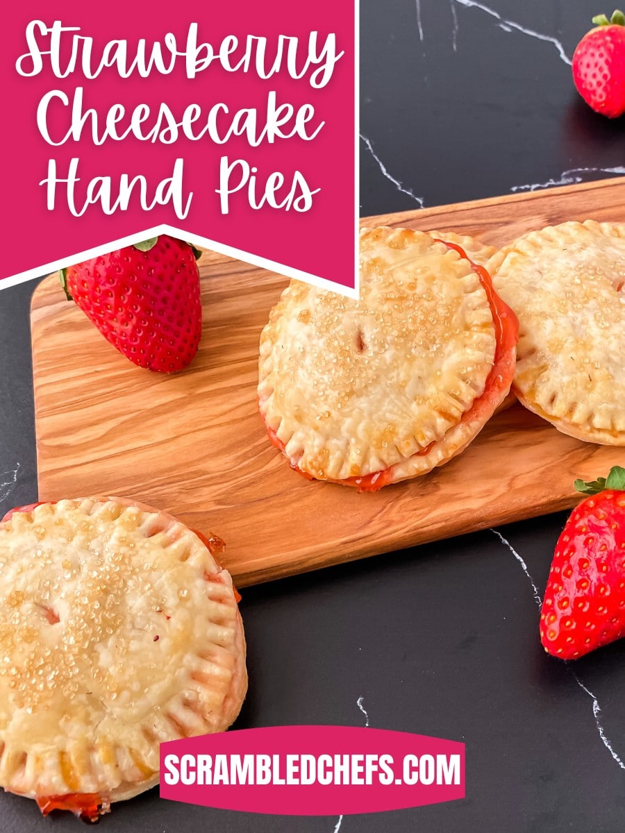 Strawberry hand pies on cutting board