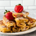 Stack of strawberry french toast rolls