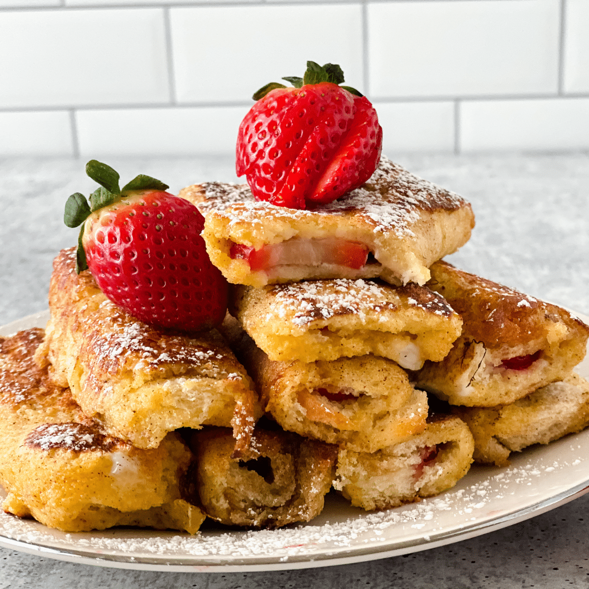 Stack of strawberry french toast rolls
