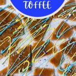 Toffee with chocolate and sprinkles on parchment paper
