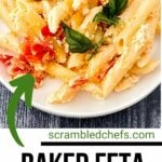Baked feta pasta on white plate with slice of bread