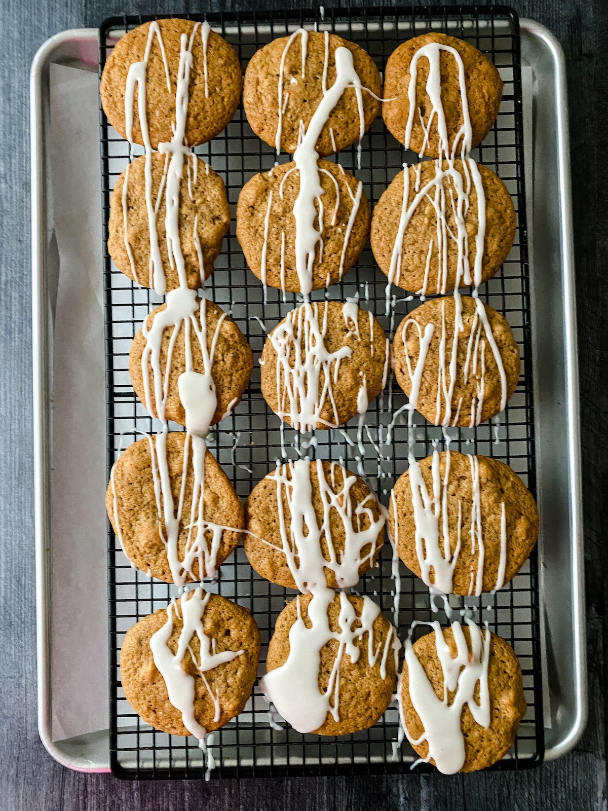 Iced cookies on wire rack