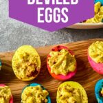 Cutting board with blue yellow and pink deviled eggs
