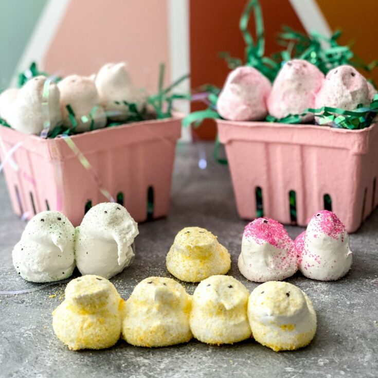 Homemade Peeps displayed on gray counter with mini Easter baskets