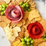 Grazing board with grapes crackers cheese and meat