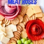 Ham and pepperoni meat roses on charcuterie board