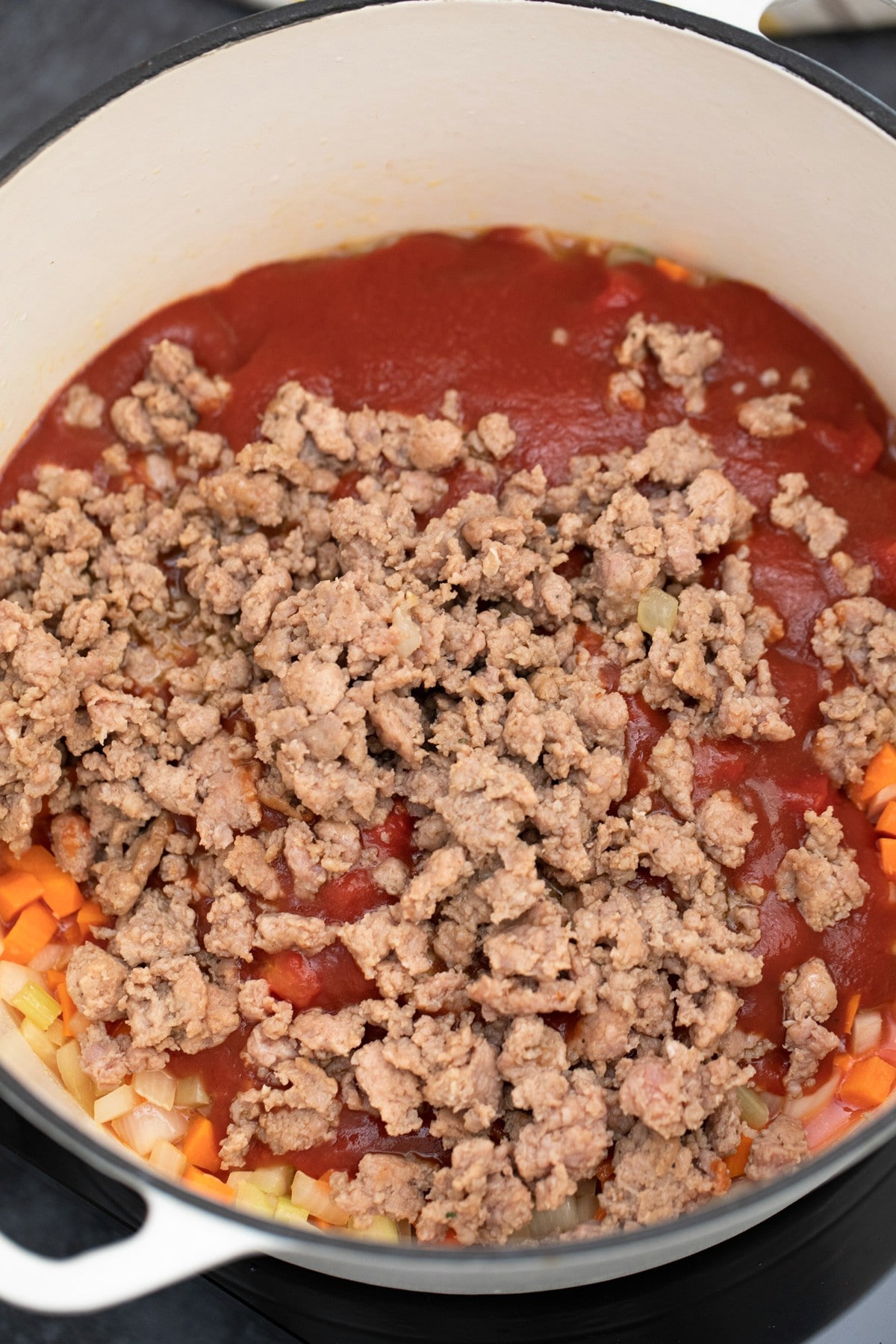 Adding ground meat into dutch oven