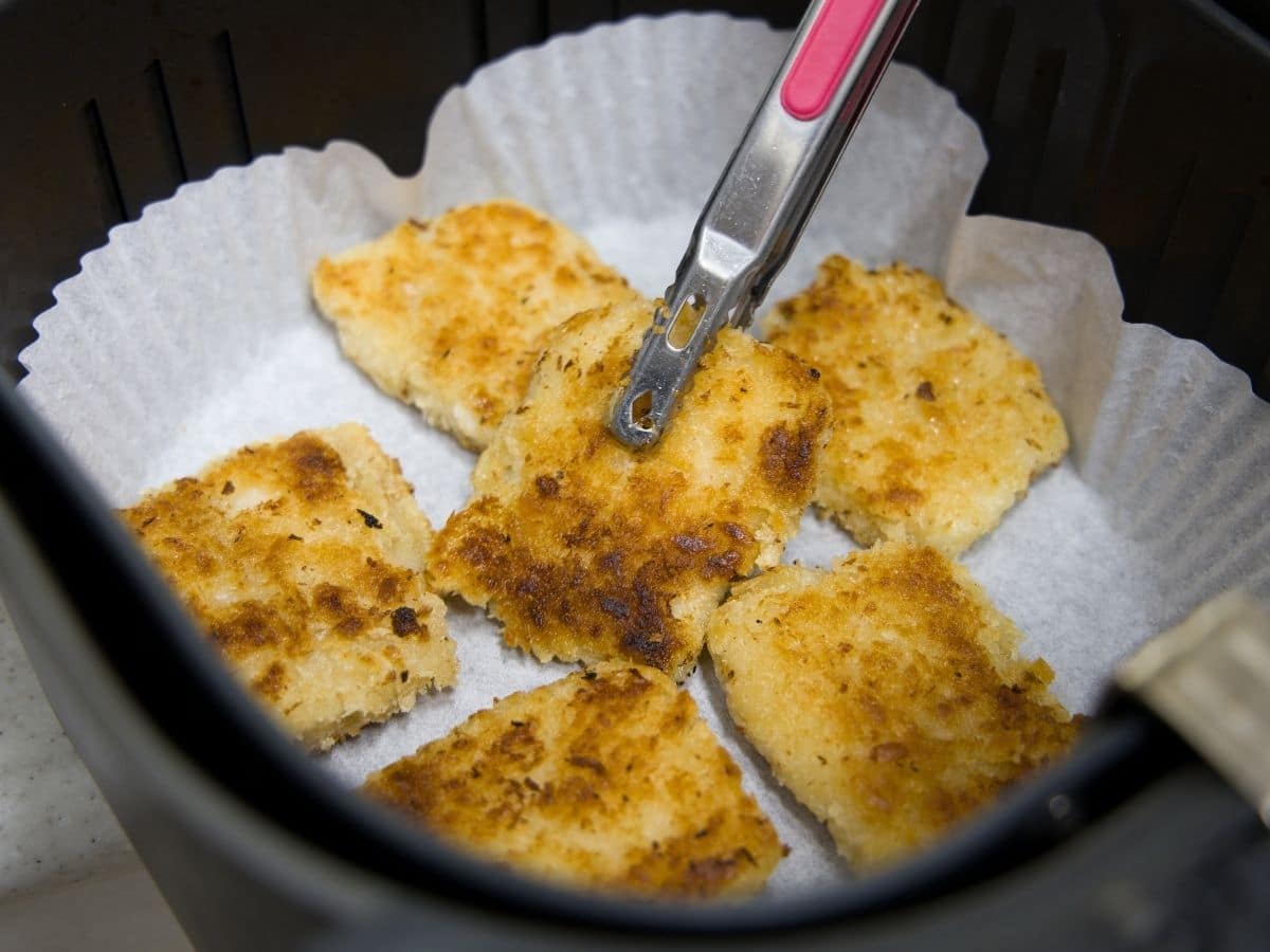 Fish fillet on parchment in air fryer