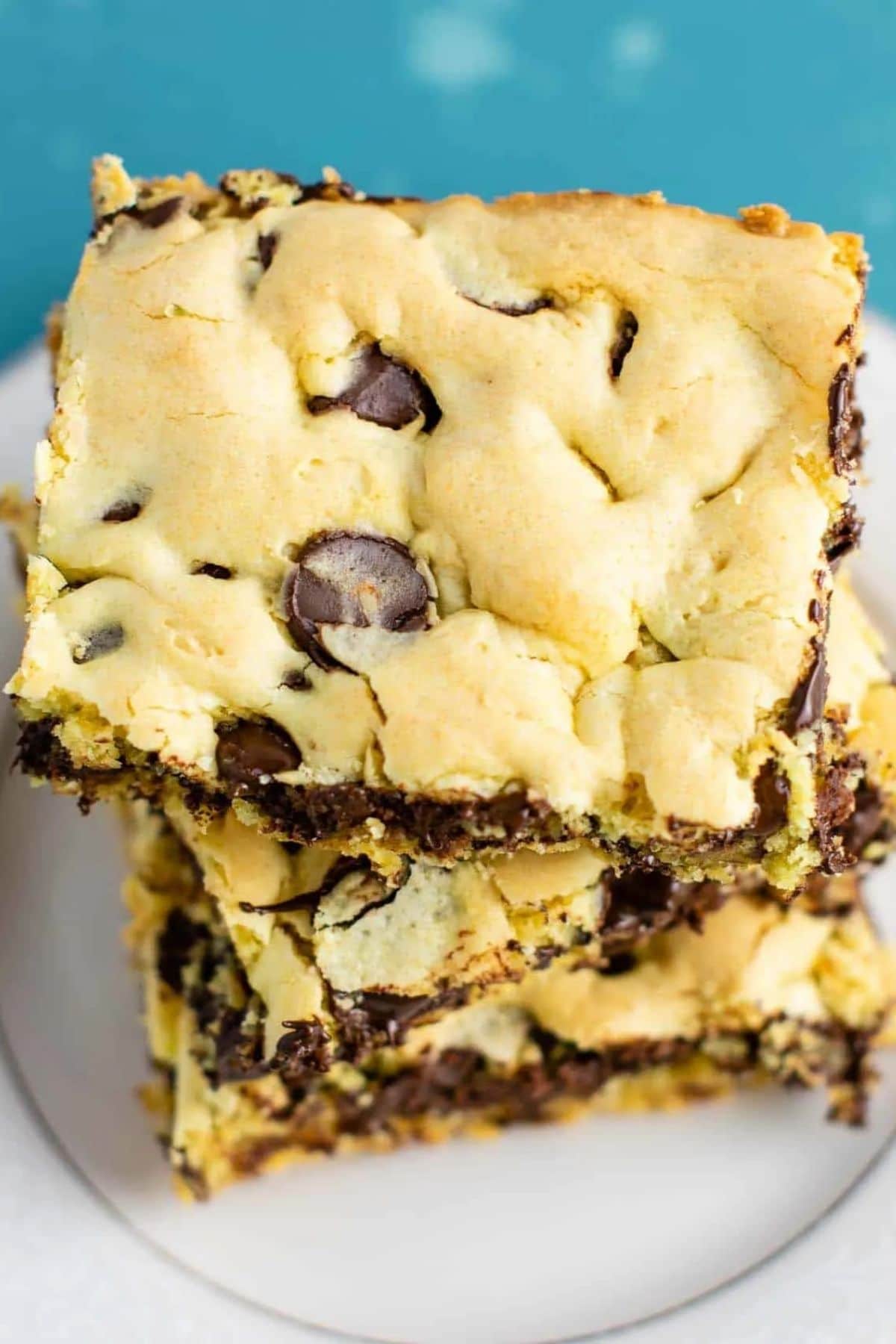 Cookie bars with chocolate chips on white plate