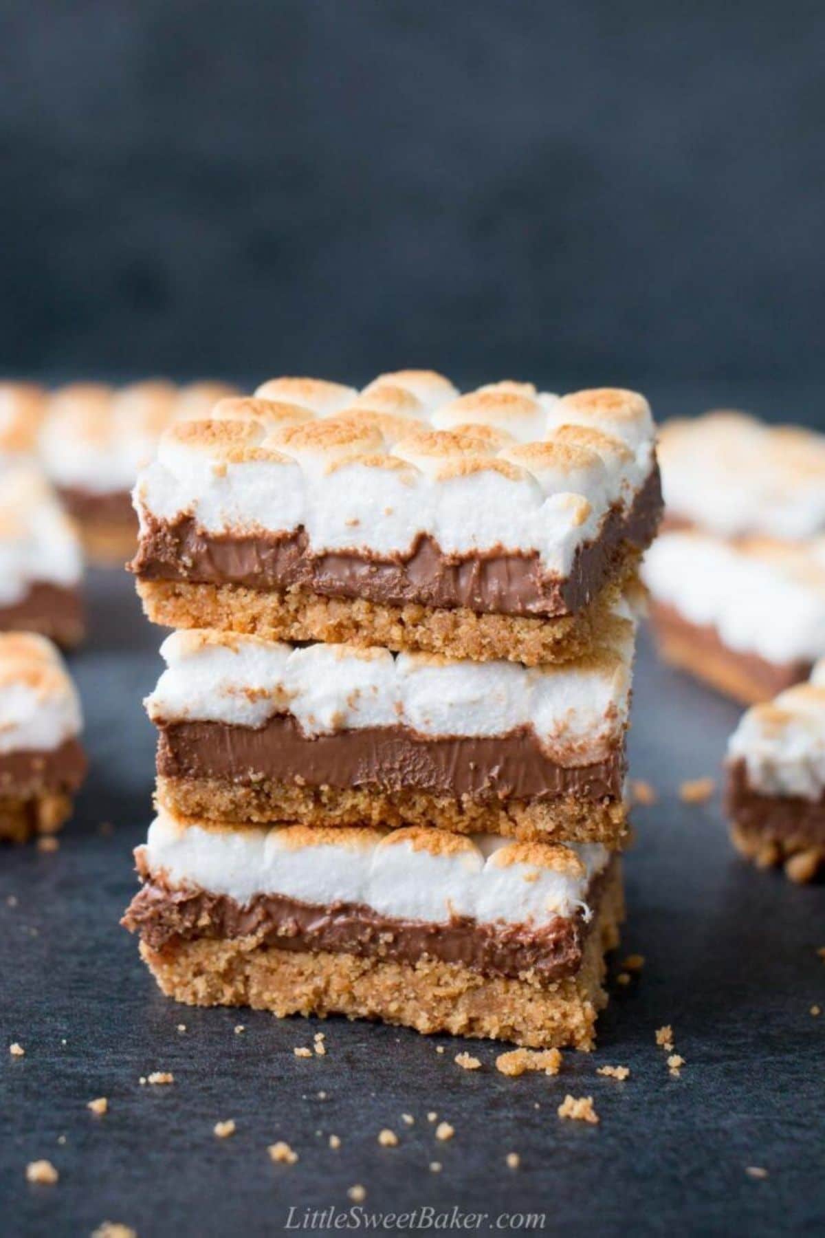 Stack of s'mores bars on black counter