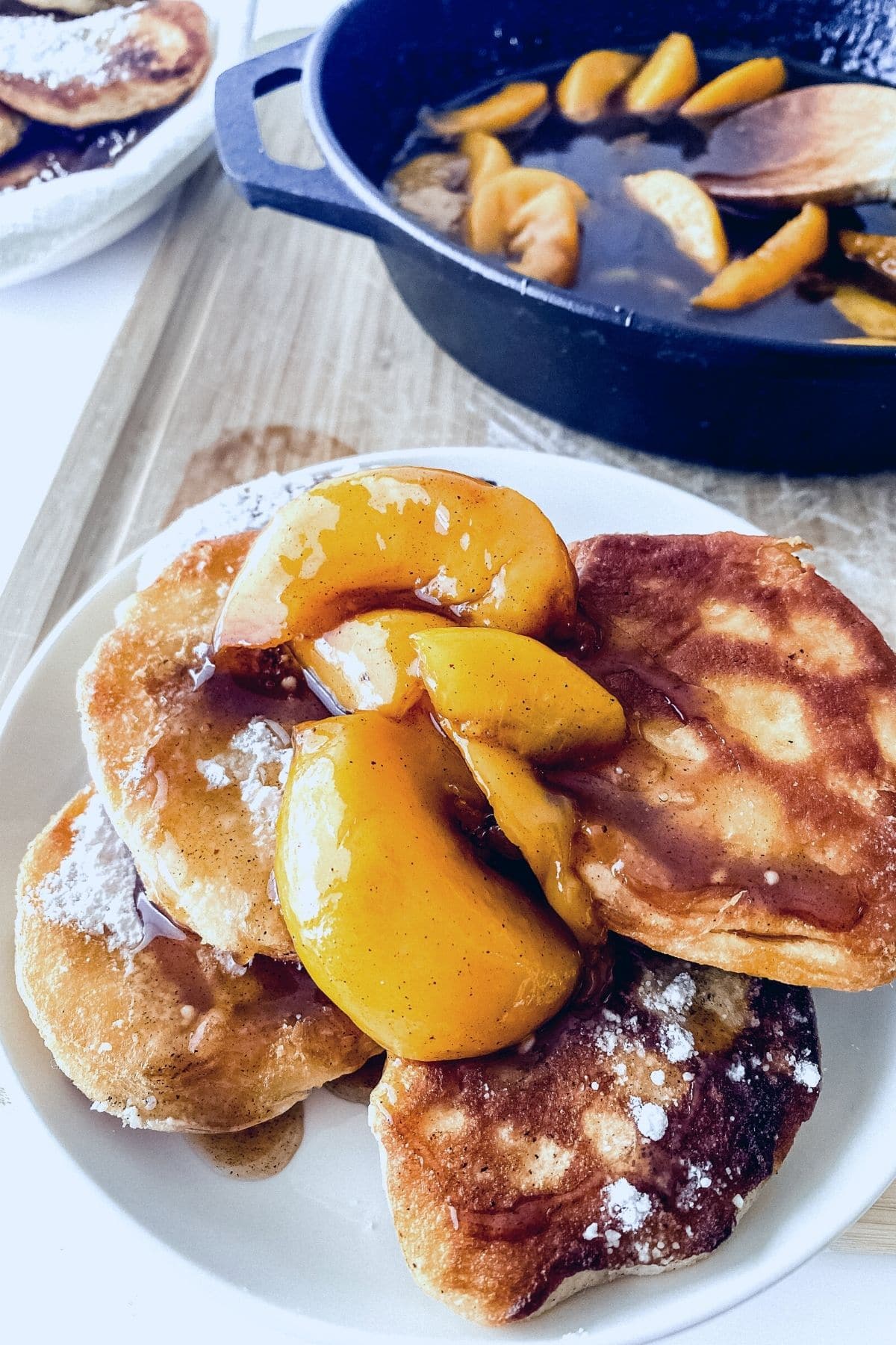 Plate of biscuits topped with peaches