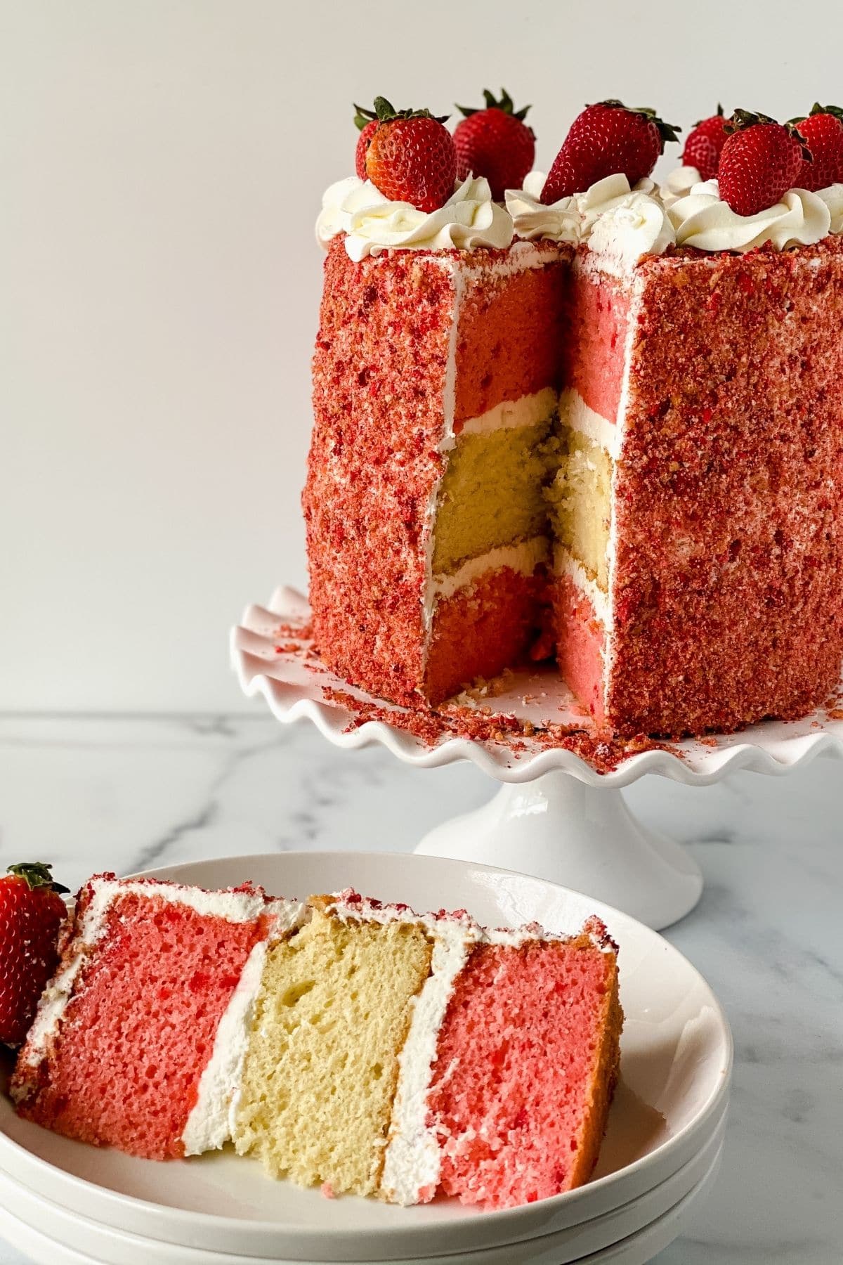 Slice out of strawberry vanilla layer cake