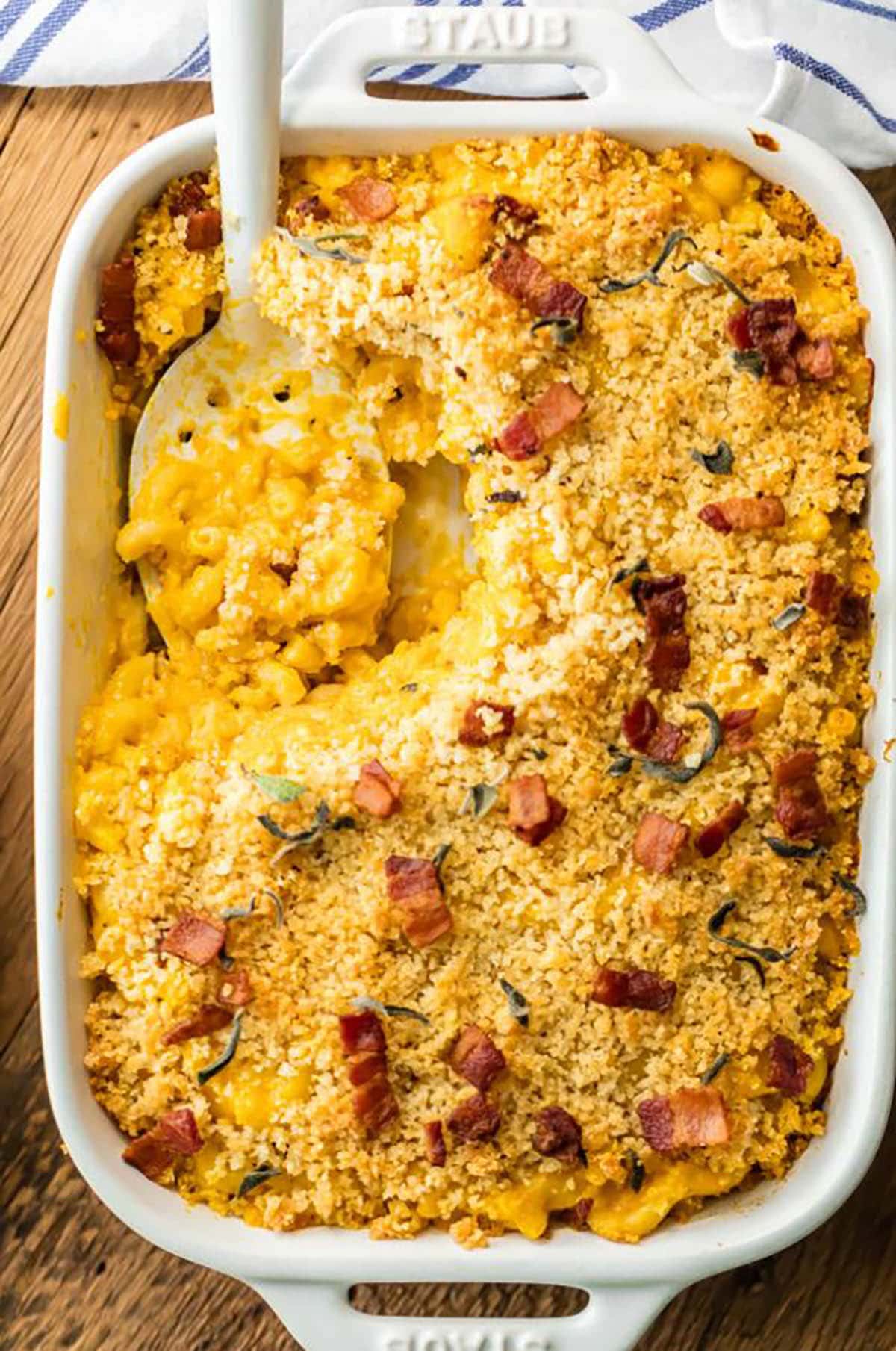 Casserole baked bacon mac and cheese with bacon, sage, and most importantly pumpkin