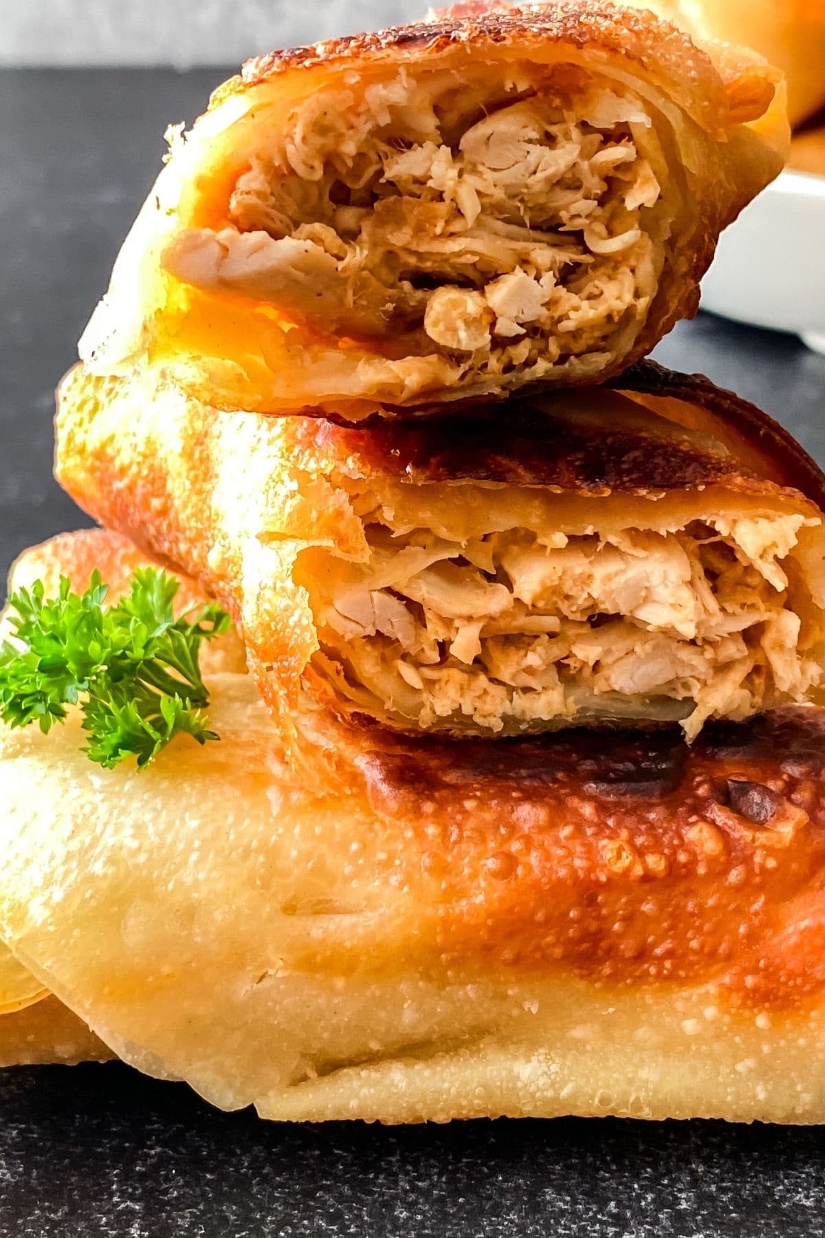 Closeup of stacked fried egg rolls