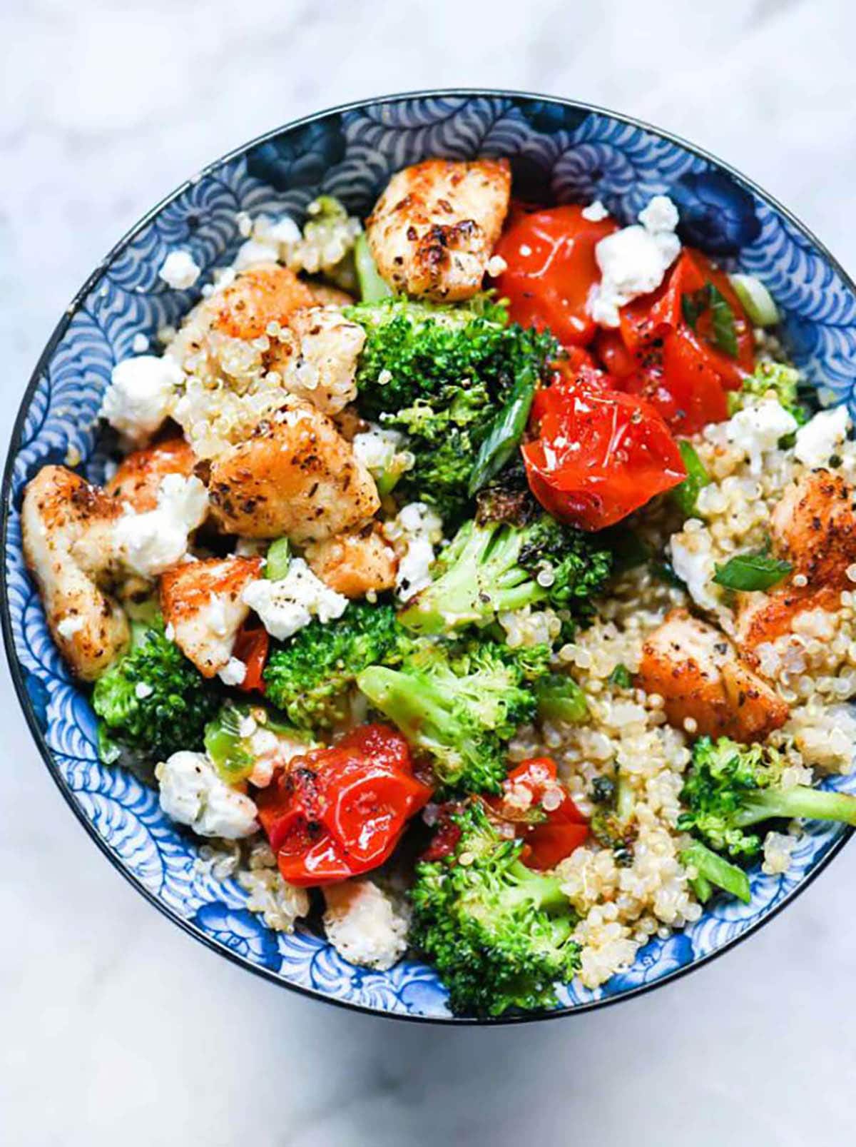Chicken and Quinoa Bowl with broccoli and tomatoes