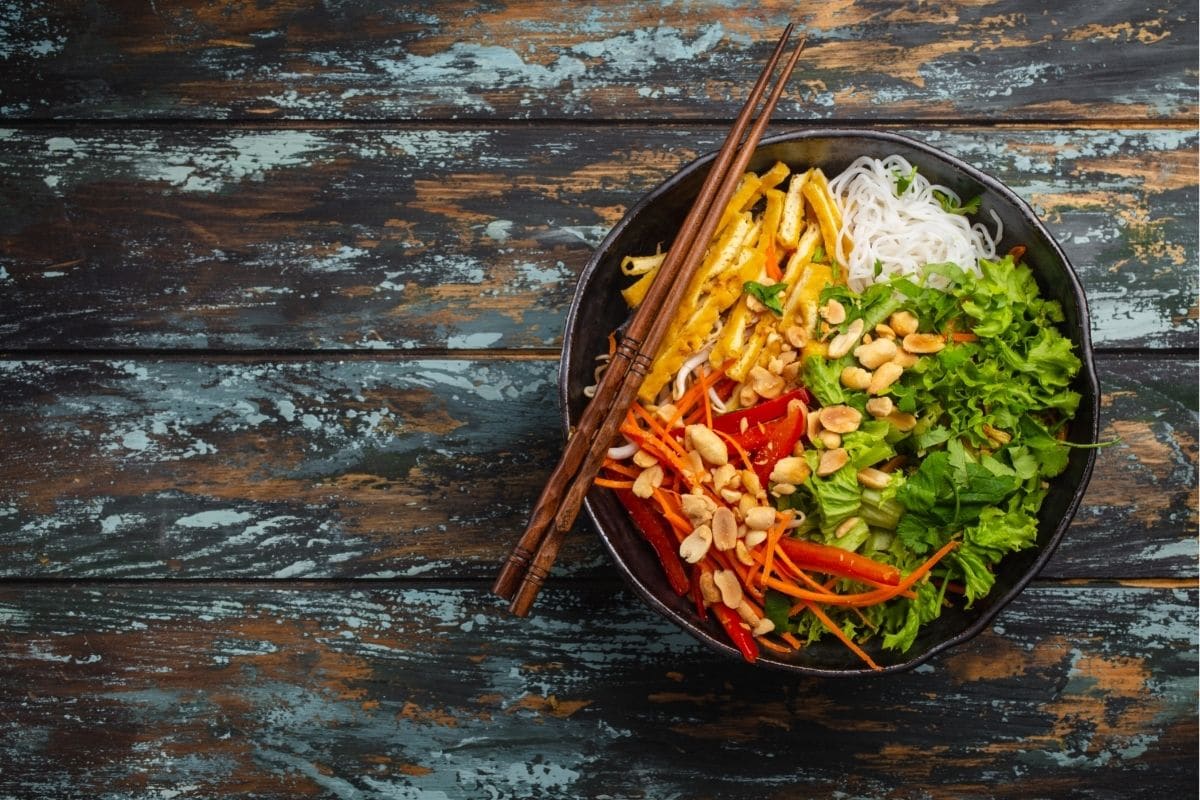 Cold Thai Noodle Salad in a bowl with chopsticks