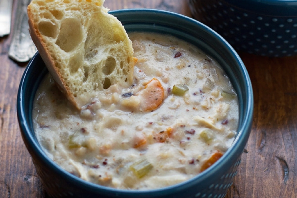 Creamy Chicken Wild Rice Soup with bread on the side
