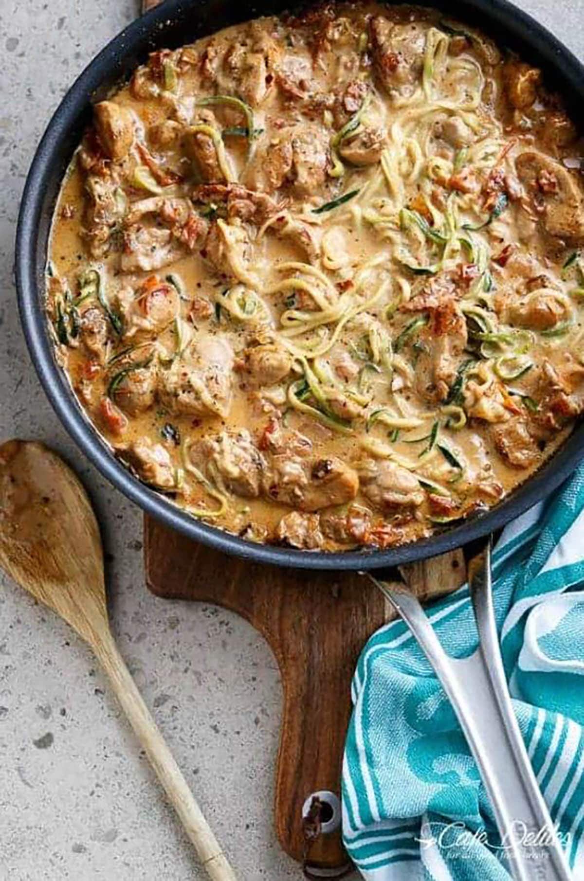 Sun-dried tomatoes and garlic and parmesan cheese infused in a cream based sauce, enveloping crispy, golden pan fried chicken strips and zoodles for the craziest low carb comfort food.