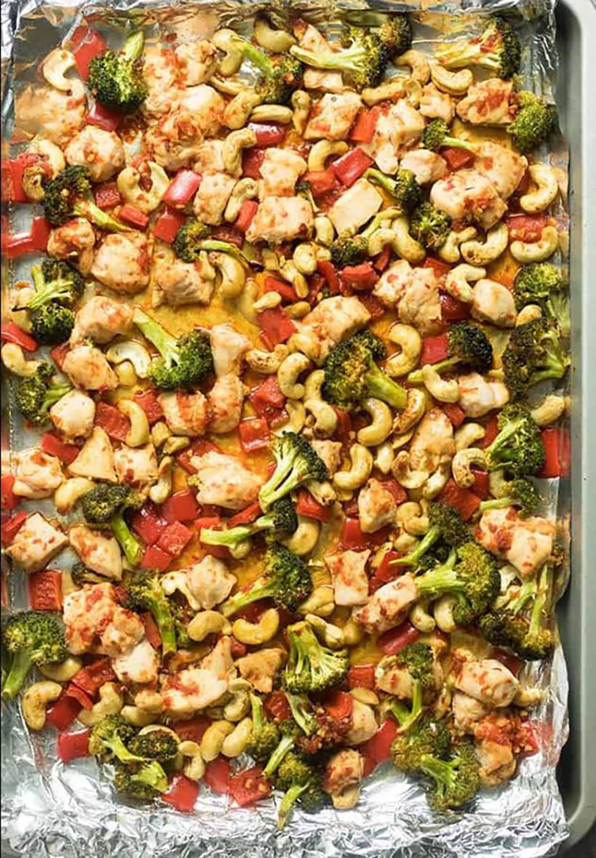 Easy Sheet Pan Cashew Chicken with broccoli and bell peppers