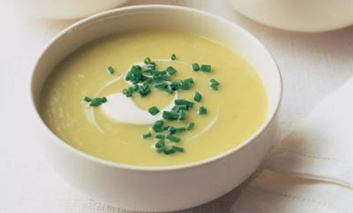 Leek and potato soup topped with chives and cream fraiche