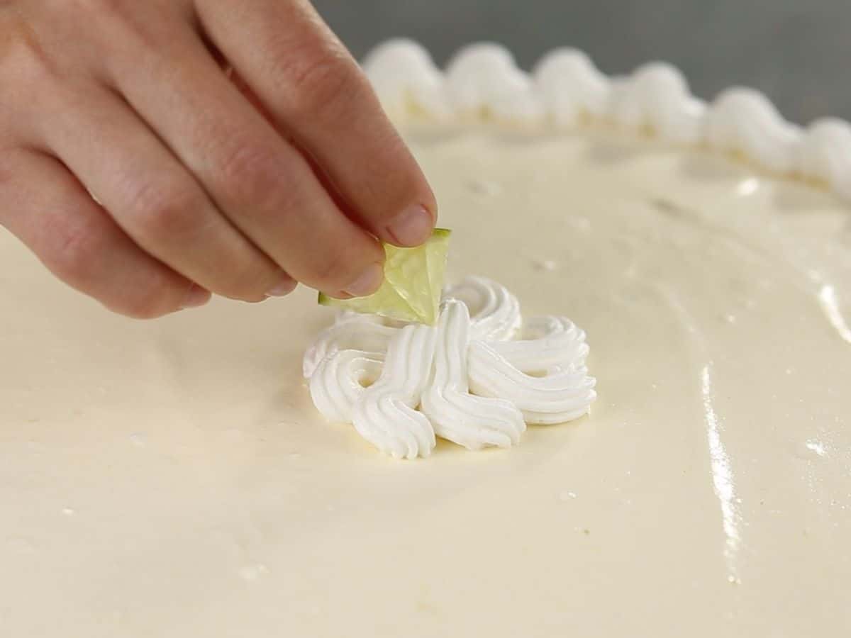 Adding a lemon slice on top of whipped cream