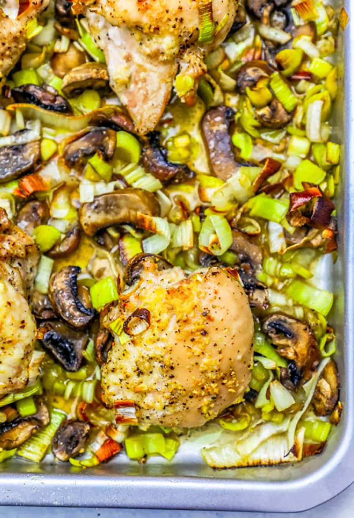 Oven Roasted Chicken, Leeks and mushrooms in a baking pan