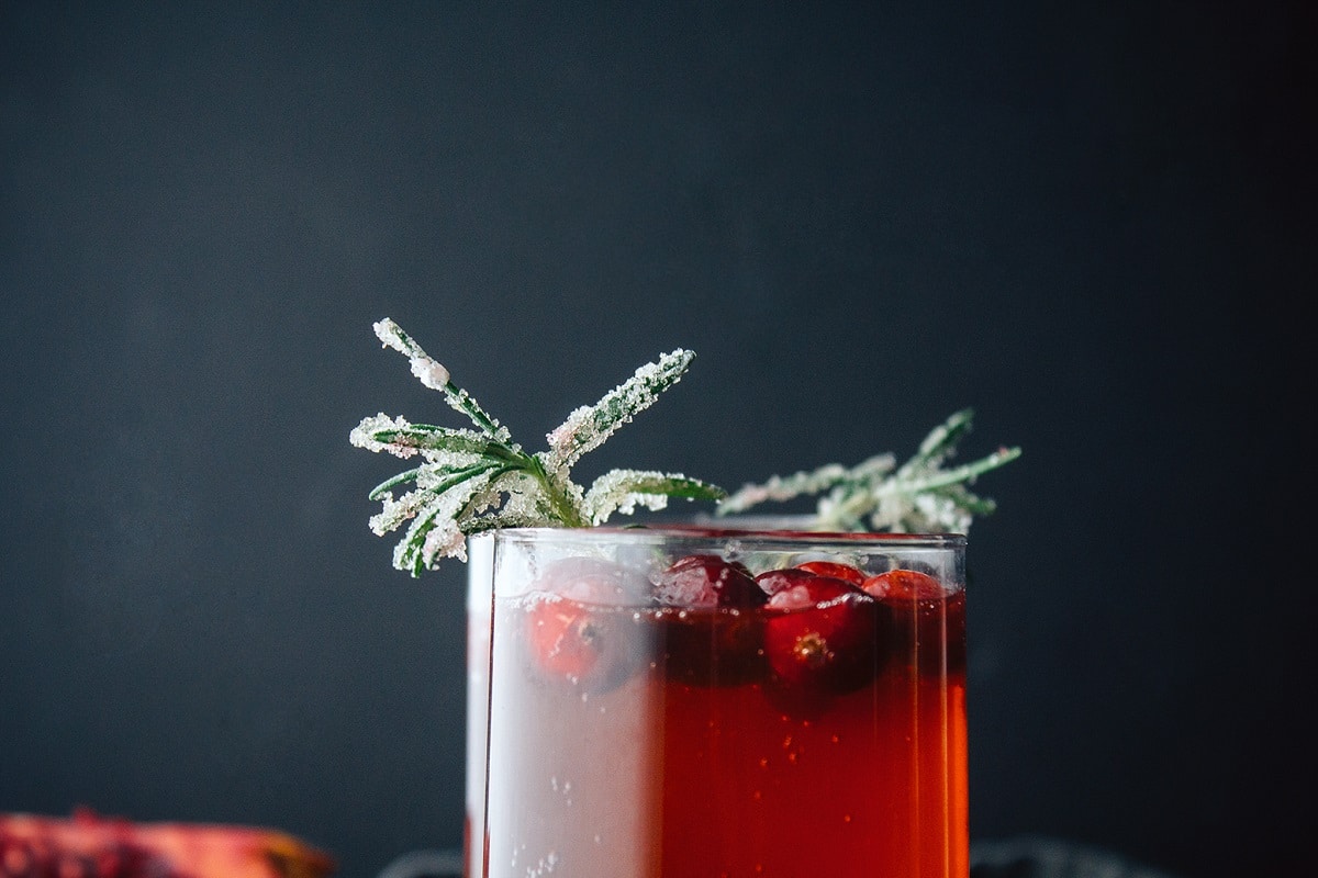 Pomegranate Cranberry Rum Punch With Candied Rosemary