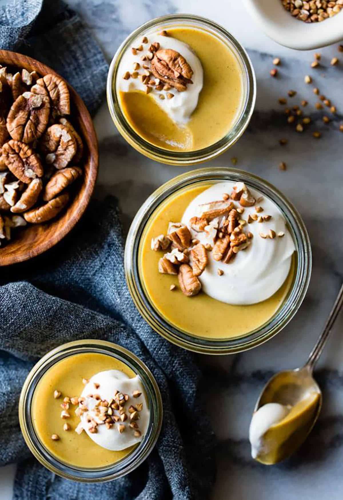 Pumpkin Butterscotch Pudding Topped with Whipped Mascarpone and Toasted Buckwheat or Pecans