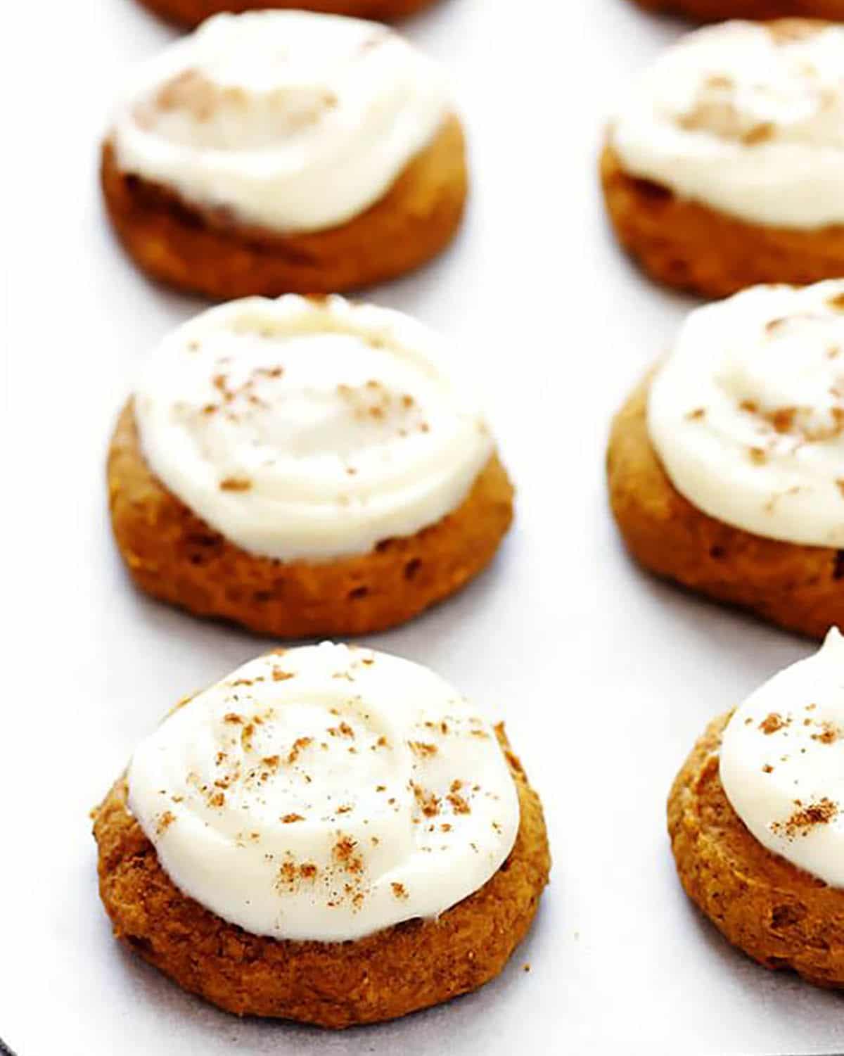 Pumpkin Cookies topped with Cream Cheese Frosting and Pumpkin Pie Spice