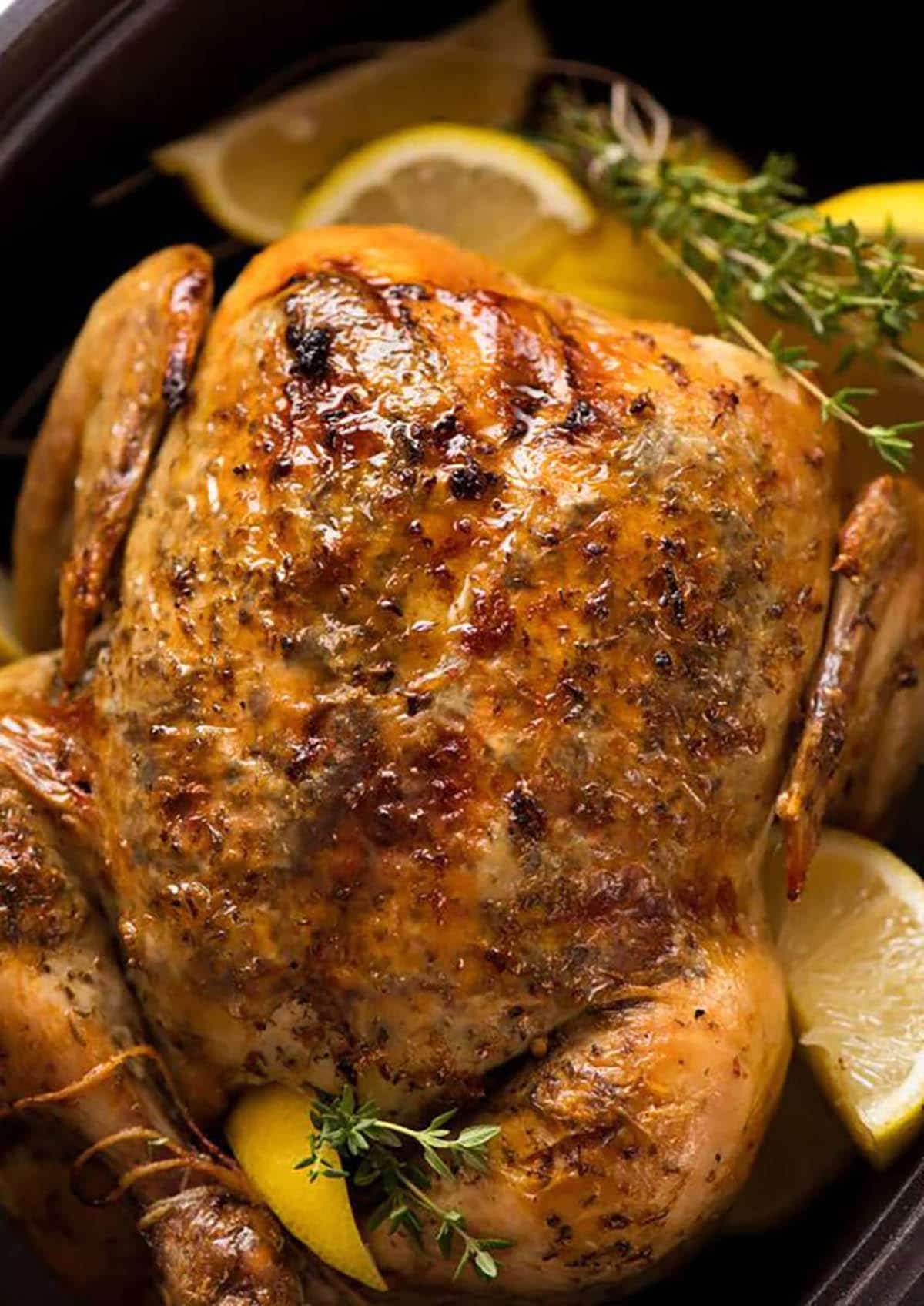 Roasted chicken with thyme and lemon slices