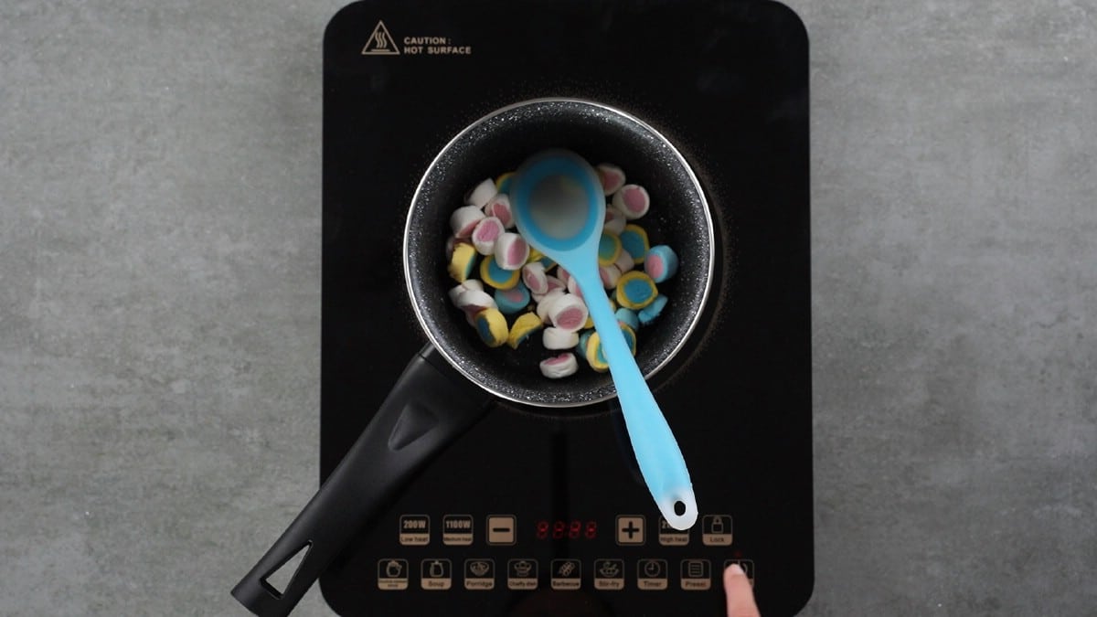 Saucepan on hot plate with marshmallows inside