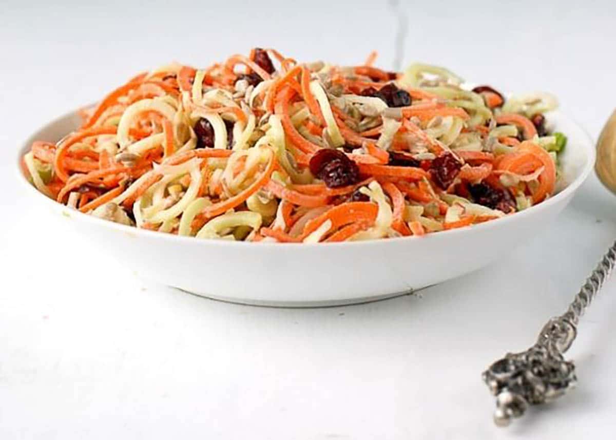 Sweet broccoli stems are the star ingredient in this crunchy, tasty slaw. Combined with carrot spirals, dried cranberries, green onion and sunflower seeds the salad has a sweet, wonderfully textured bite.