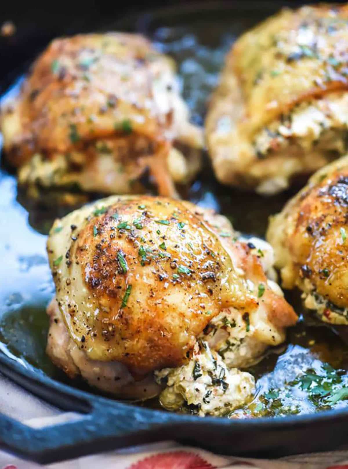 Stuffed Chicken Thighs with spinach and artichoke hearts