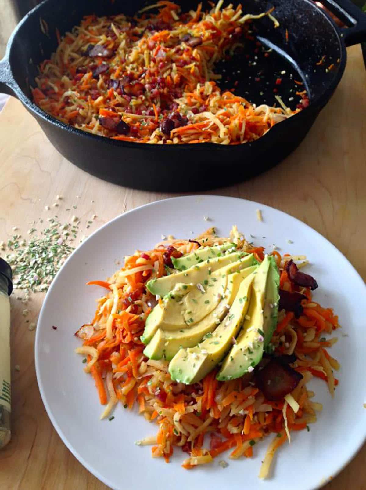 Sunny Sweet Potato Hash Topped with Sliced Avocados