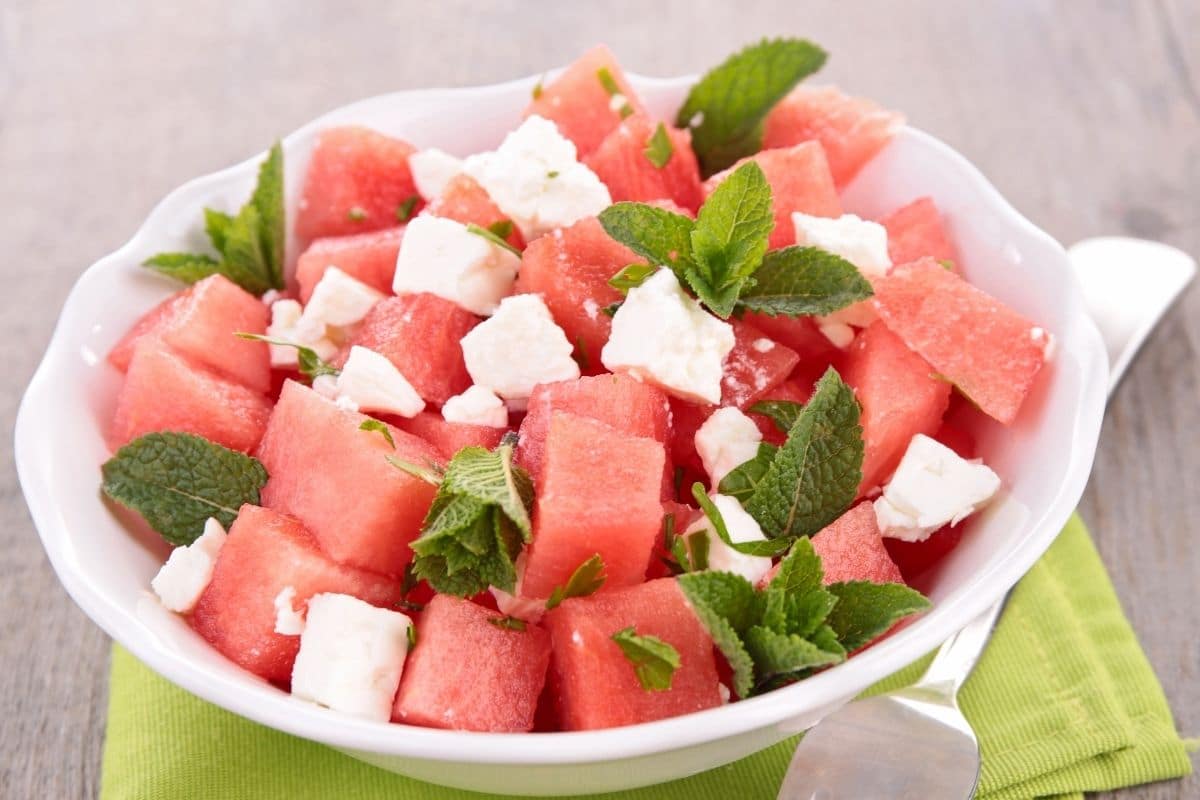 Watermelon, Feta, and Basil Salad on a white bowl