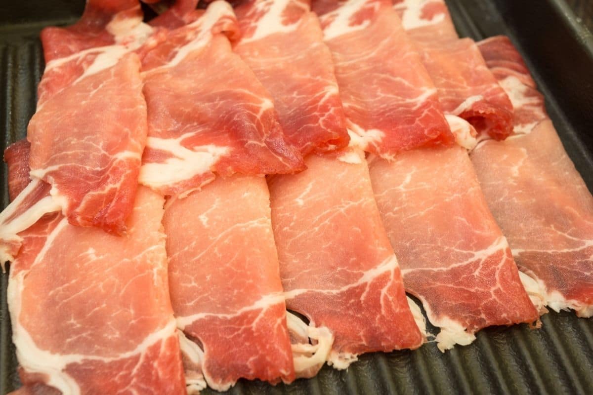 Slices of Meat on a defrosting tray