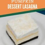 Pumpkin dessert lasagna on white plate with orange overlay on top