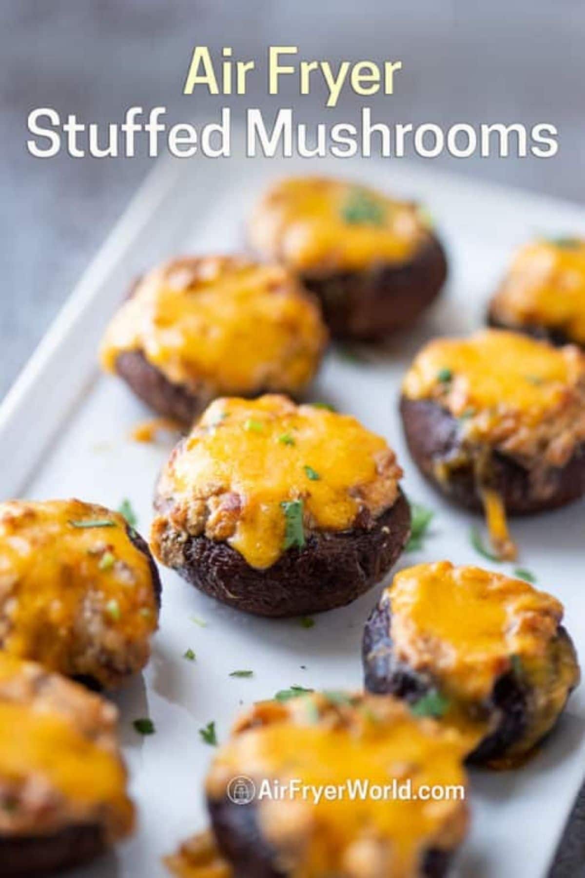 Platter of stuffed mushrooms with cheddar on top