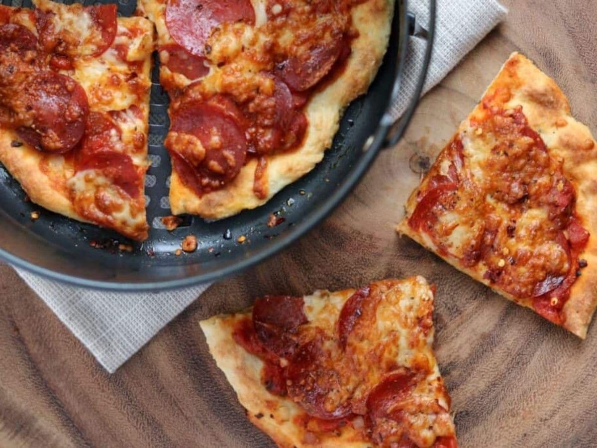 Pepperoni pizza slices on table