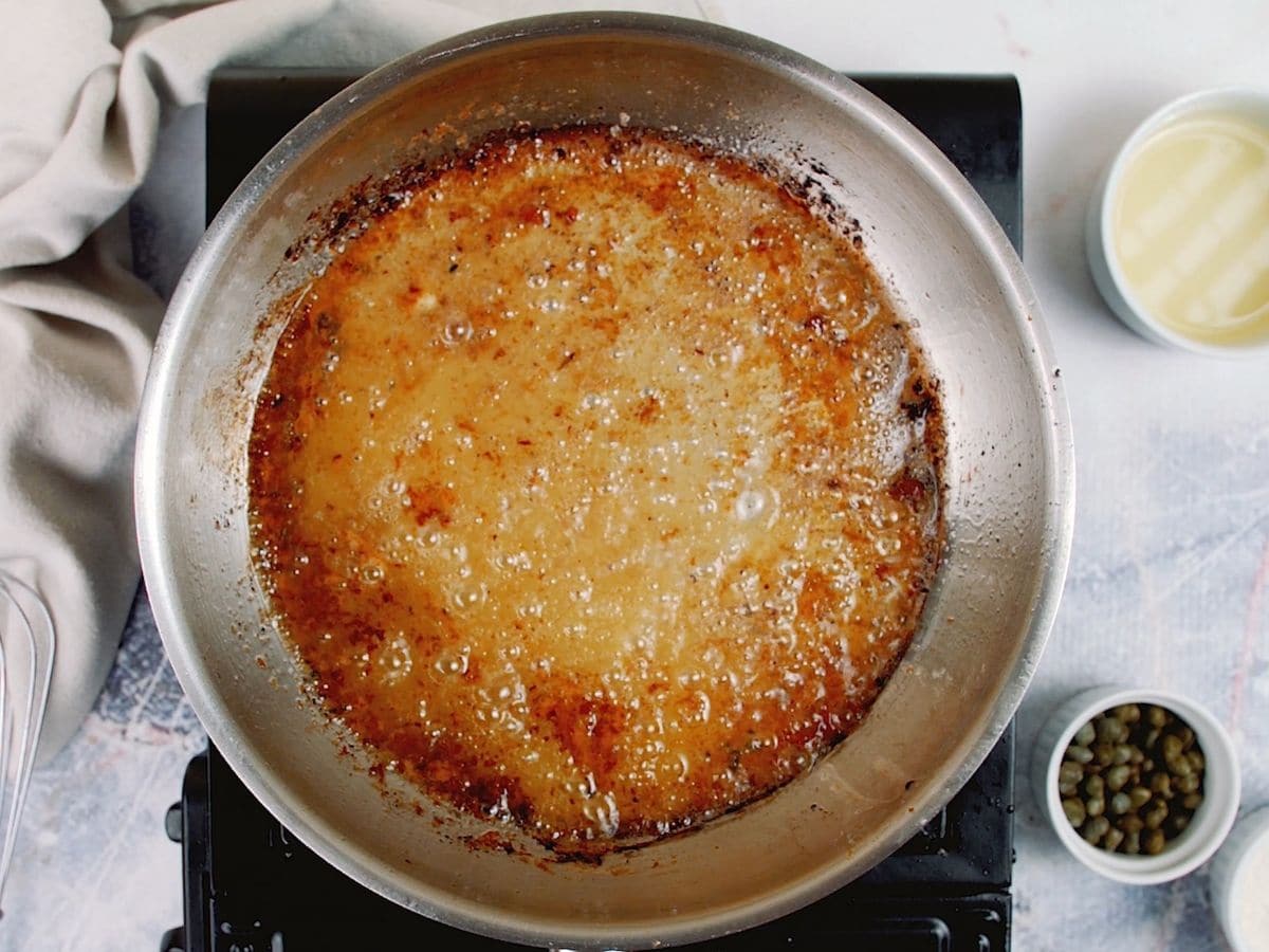 Broth in pan deglazing food