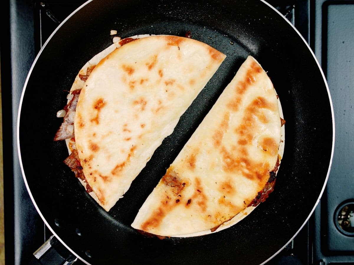 Two tacos in skillet
