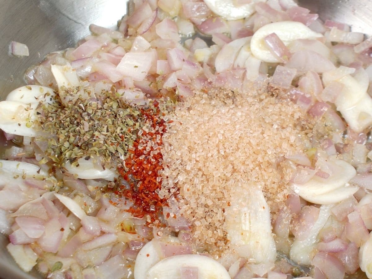 Onions and spices in skillet