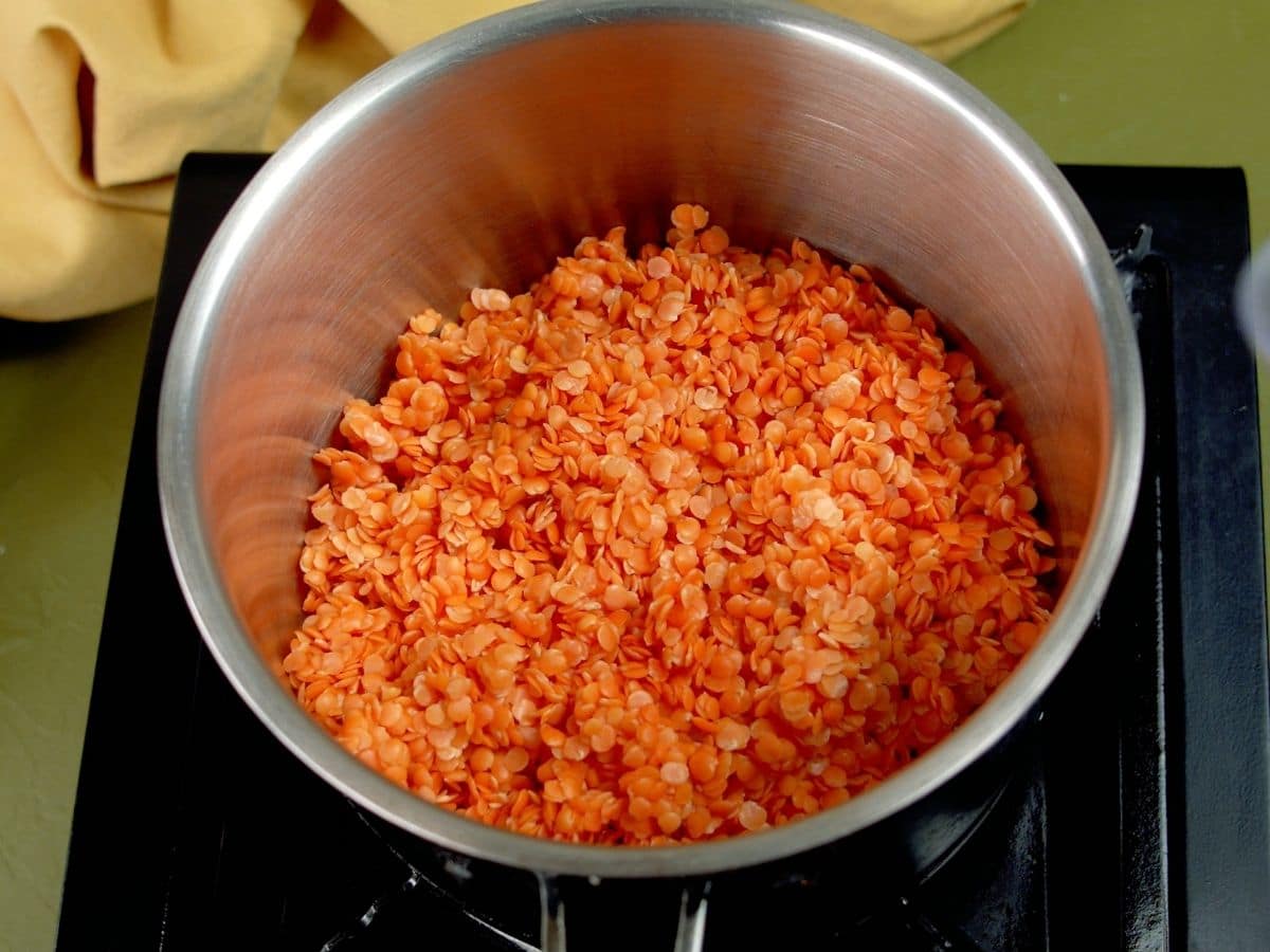 Red lentils in saucepan